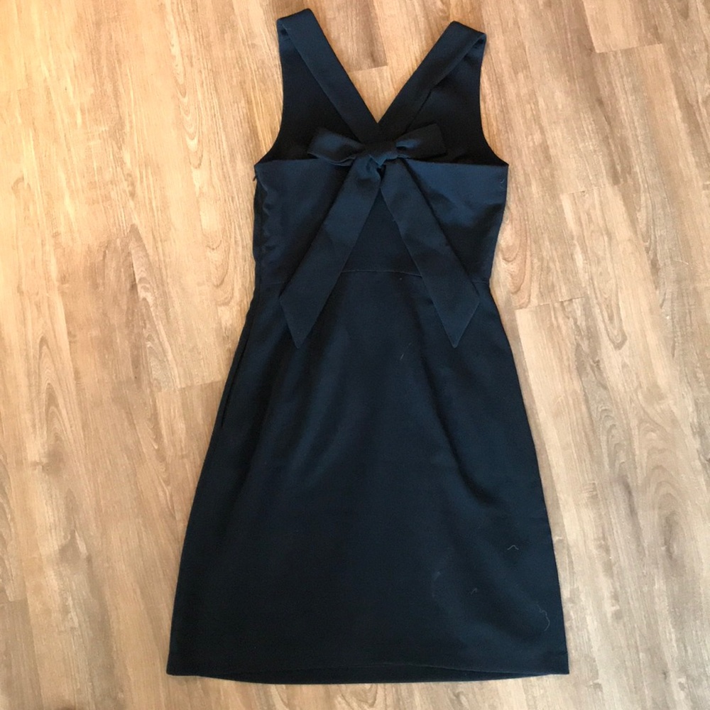 Fully lined black dress w/ bow back